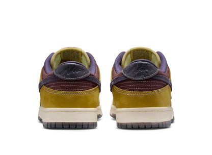 Nike Dunk Low Retro SE in Buff Gold / Dark Raisin
